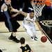 Michigan sophomore Trey Burke drives on the baseline in the game against South Dakota State on Thursday, March 21. Daniel Brenner I AnnArbor.com